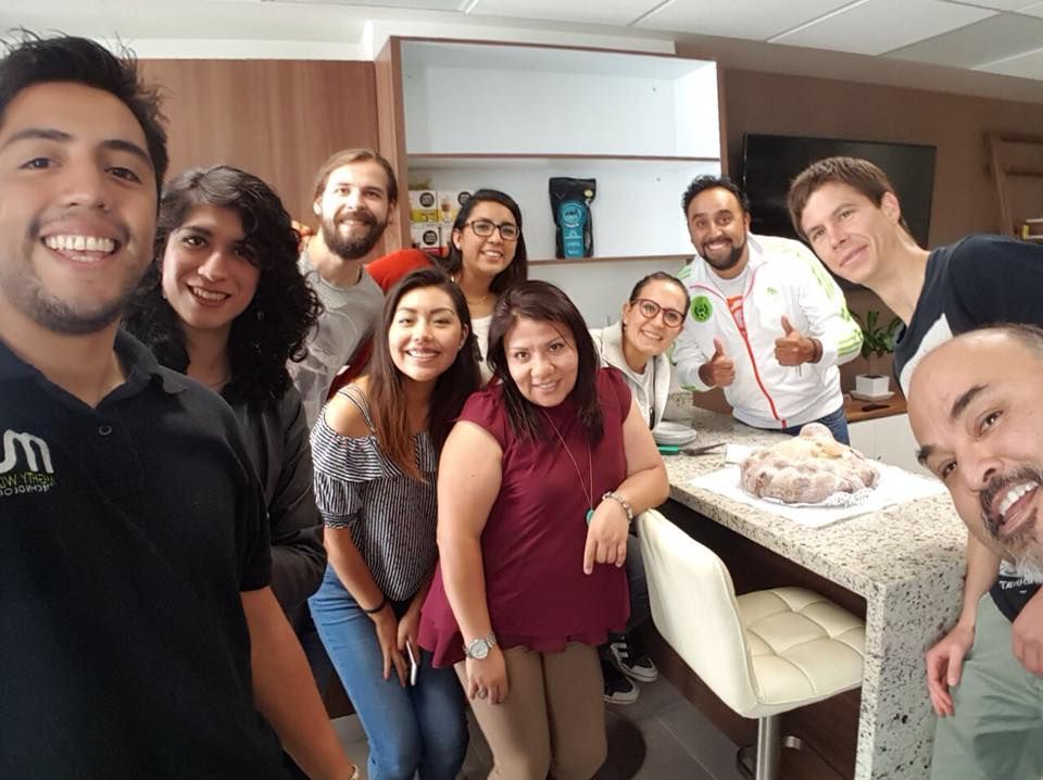 Daevo team celebrating together over lunch