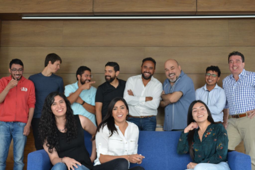 The Daevo team gathered together, smiling